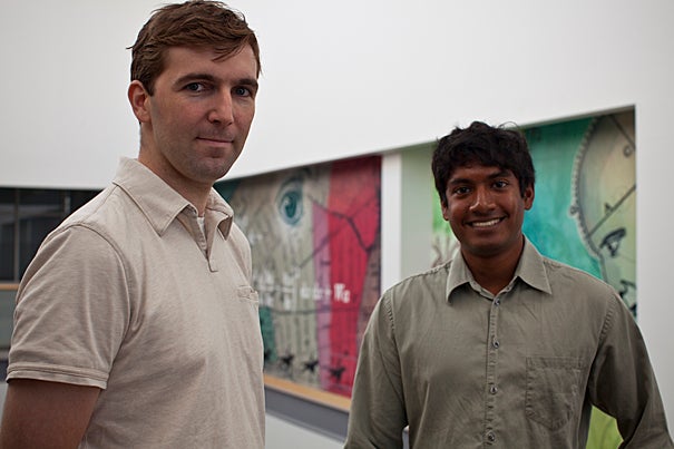 Associate Professor of Electrical Engineering Robert J. Wood (left) and graduate student Pratheev S. Sreetharan are working on miniature flying vehicles that could someday be used to probe environmental hazards, forest fires, and other challenges too perilous for people.