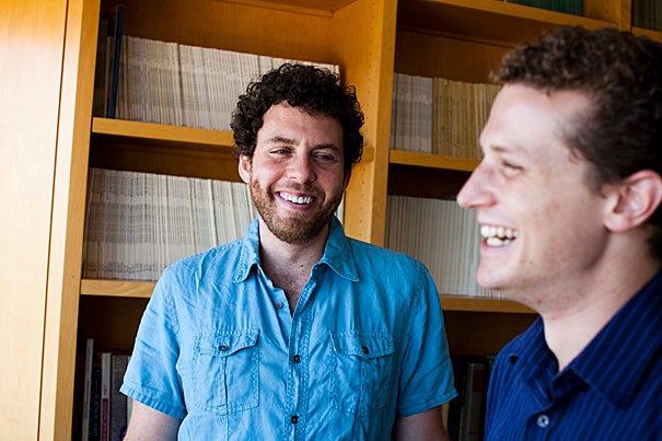 Joshua Greene (left) and Amitai Shenhav have found that people  make major moral decisions using the same brain circuits used for more mundane choices, like spending money or choosing food.