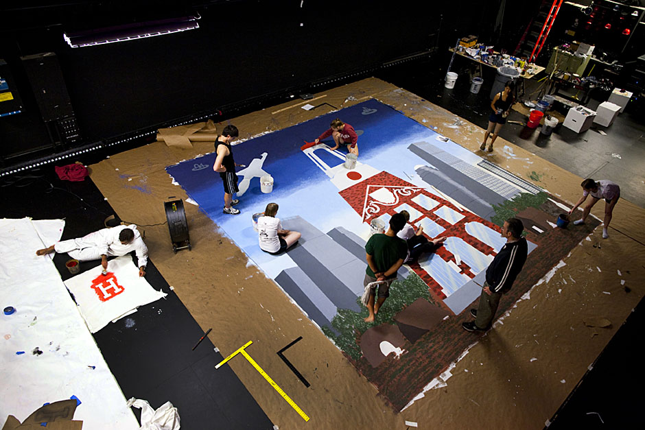 Freshmen work to complete the pageant backdrop. Stephanie Mitchell/Harvard Staff Photographer