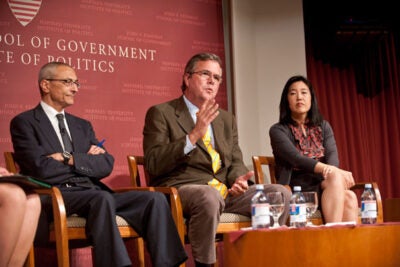John Podesta (from left), Jeb Bush, and Michelle Rhee offered ideas on education reform at a Harvard Kennedy School talk Nov. 18. “I made education the chief political issue before I made it the chief policy issue,” said Bush, who is finishing a weeklong visiting fellowship at the Institute of Politics. “If you have a passion for something, you shouldn’t keep it a secret.” 