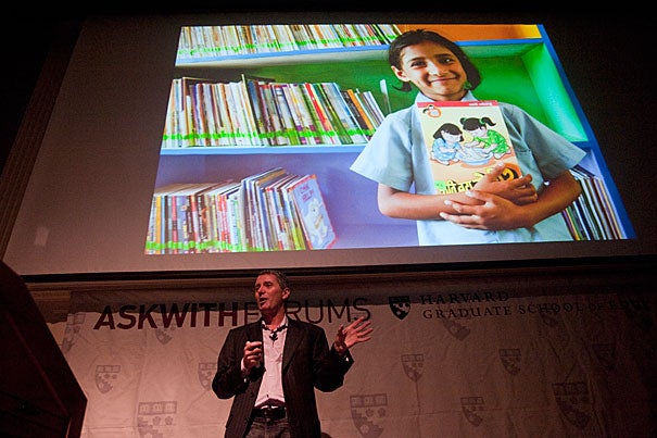 John Wood, founder of Room to Read, which educates children in the developing world through initiatives on literacy and gender equality in education, speaks at the Harvard Graduate School of Education on Nov. 4. In 10 years, Room to Read has opened 1,000 schools, provided 10,000 long-term scholarships to girls, and opened more than 10,000 bilingual and multilingual libraries, serving more than 4 million children.