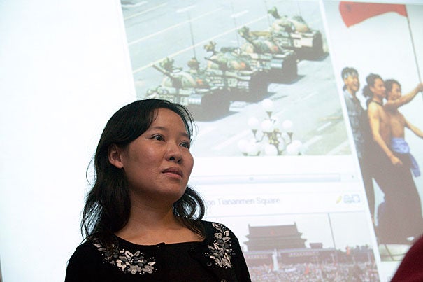 Twenty-one years ago, when Rowena He wore a black armband as a gesture of mourning on the day after the Tiananmen Square violence, she recalls being told, “If you don’t take that off, no one will protect you.” Now she is teaching a freshman seminar, “Rebels With a Cause: Tiananmen in History and Memory,” that tackles the infamous Chinese protests. 