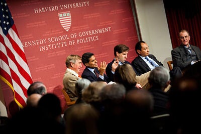 “Sam’s legacy is … vibrant in the current thinking of his students,” said Graham Allison, who moderated a panel on Huntington at the John F. Kennedy Jr. Forum. The panelists — all Harvard Ph.Ds who were either Huntington’s students or influenced by him — acknowledged his qualities as a teacher, debater, and scholar. The panel included (from left) Graham Allison, Fareed Zakaria, Gideon Rose, Francis Fukuyama, and Eliot Cohen.