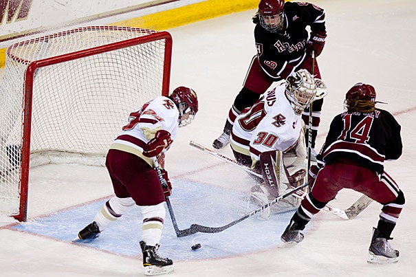 Harvard's Jillian Dempsey (right) nearly scores against Boston College in the Beanpot finals at Conte Forum on Tuesday (Feb. 15). Boston College prevailed 3-1.