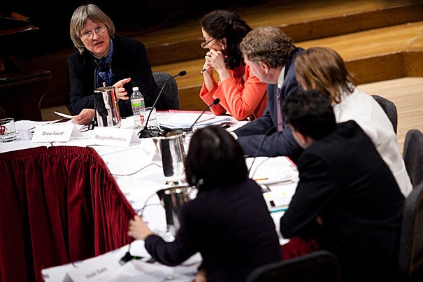Ten years after the Human Genome Project completed the human genome’s first draft, Harvard President Drew Faust (far left) hosted a panel discussion on the legacy of “biology’s moonshot.”  The panelists included (from left) Margaret Hamburg, Eric Lander, M. Susan Lindee, Vamsi Mootha, and Vicki Sato.