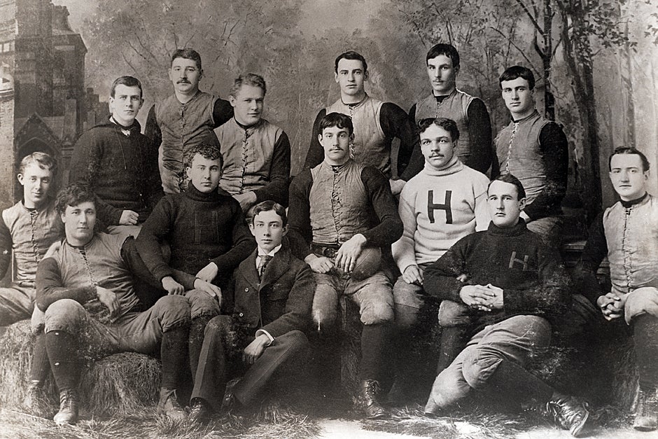 William H. Lewis, LL.B. 1895, was the first African American named to a College Football All-America Team. He was the first African American to be honored as an All-American. Lewis was hired as a football coach at Harvard, where he served from 1895 to 1906. This Varsity Football Team fall season photograph shows Lewis (third from right, seated) in 1892. Credit: Harvard University Archives, call # UAV 170.270.2 PF