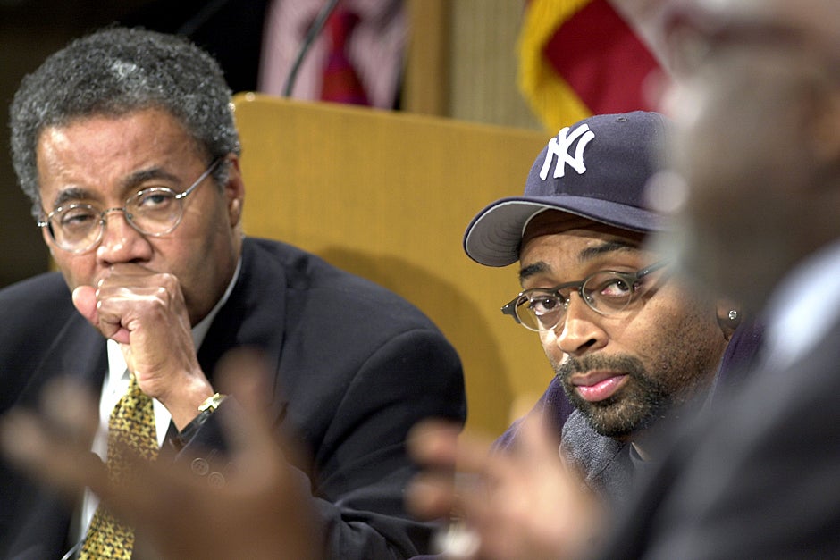 Nov. 6, 2000. Harvard Medical School Faculty Associate Dean for Student Affairs Alvin Poussaint (left) and movie director Spike Lee listen to cultural and jazz critic Stanley Crouch speak during a discussion at the Harvard Kennedy School about Lee's movie “Bamboozled” and race in the media. Photo by Justin Ide/Harvard Staff Photographer 