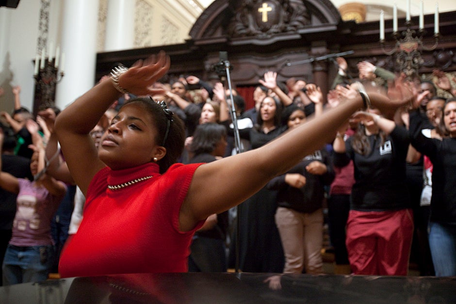 Dec. 4, 2009. Amber James ’11 rehearses for the Kuumba Singers of Harvard College winter concert inside the Memorial Church: “The songs we sing and the dances we do and the poems we read, they are all designed to bring people together in celebration of black creativity and spirituality. The concert is so moving because of the range of emotions that are represented in music from the black diaspora. Pain, sorrow, strength, resilience, peace, joy, love, and countless others are all intensely felt through the music and movements.” Photo by Kris Snibbe/Harvard Staff Photographer  
