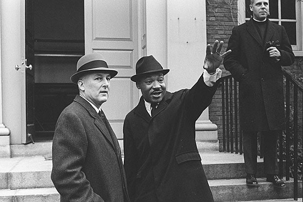 A well-known photo of Harvard President Nathan Pusey (left) and Martin Luther King Jr. at Harvard on Jan. 10, 1965. On Feb. 7, the Rev. Gregory Boyle, executive director of Homeboy Industries in Los Angeles, will deliver a keynote address honoring King's mission. 