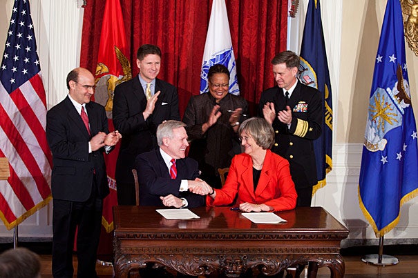 Harvard University will again host a Reserve Officers' Training Corps (ROTC) program on campus. The agreement, signed Friday afternoon at Loeb House by Secretary of the Navy Ray Mabus (left) and President Drew Faust, will end a 40-year hiatus. 