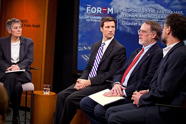 Jennifer Leaning (from left) moderated a Harvard School of Public Health forum with Michael VanRooyen, Gordon Thompson, Michael Reich, and Takashi Nagata (below) on the crises in Japan and keys to an effective disaster response.