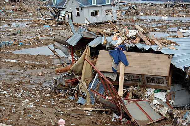 Mud, trash, and wrecked houses were swept a mile inland by the tsunami that struck Kesennuma and a swath of coastal Japan. Nearby, a Buddhist temple stood untouched. It was on land a mere foot higher in elevation.