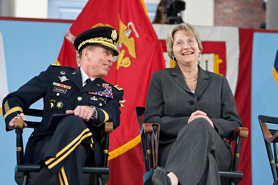 Gen. David H. Petraeus and Harvard President Drew G. Faust share a laugh during the 2009 ROTC commissioning ceremony. Jon Chase/Harvard Staff Photographer