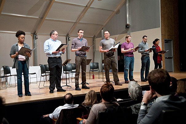Kaaron Briscoe (from left), Larry Coen, Nick Crandall, Brent Harris, Ed Walsh, Nathan Darrow, and Linda Powell present "Ajax and Philoctetes," part of a collaborative project between the A.R.T. and the arts group Theater of War. The reading formed the basis for a town hall discussion examining the challenges faced by veterans, service members, families, friends, and community members, all dealing with the psychological effects of war.