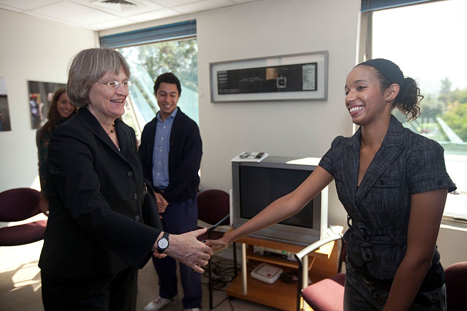 March 21, 2011. Harvard President Drew Faust (from left) meets with Mary Espada '12, Sam French '12 (background), and other Harvard students during a visit to the David Rockefeller Center for Latin American Studies’ regional office in Santiago, Chile. Photo by Kris Snibbe/Harvard Staff Photographer