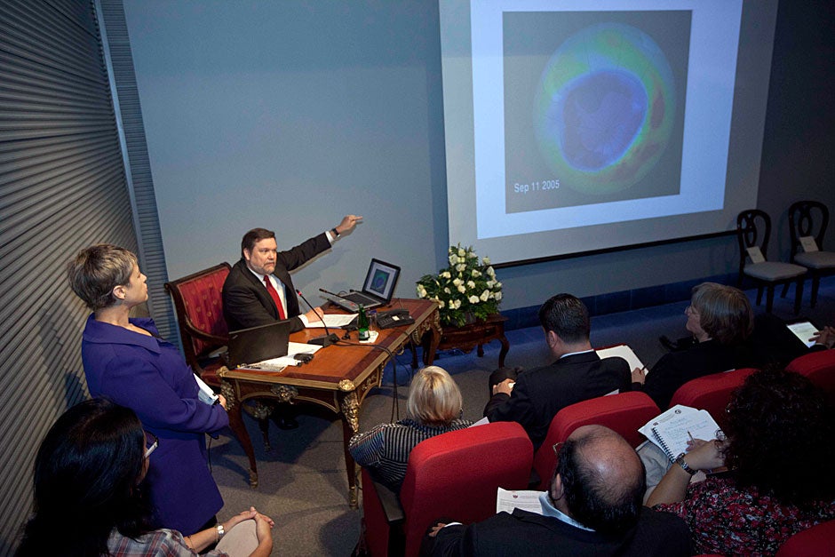March 22, 2011. David Ellwood, dean of the Harvard Kennedy School and Scott Black Professor of Political Economy, displays an image of the hole in the ozone layer around the Earth during the presentation “What More Can Harvard University Do To Add Value to the Earthquake Reconstruction Process One Year After the Disaster?” The talk was part of the ENLACE Earthquake Reconstruction Project. Photo by Kris Snibbe/Harvard Staff Photographer