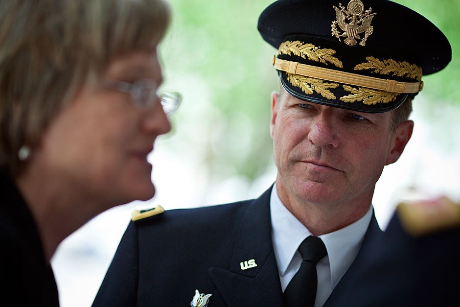 Harvard President Drew Faust (left) speaks with Maj. Gen. James McConville prior to the Harvard ROTC Class of 2011 Commissioning Ceremony in the Tercentenary Theatre. Justin Ide/Harvard Staff Photographer