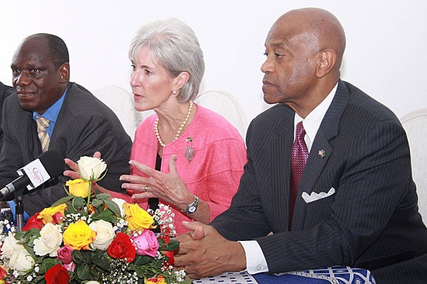 Tanzanian Minister of Health and Social Welfare Haji Mponda (from left),  U.S. Health and Human Services Secretary Kathleen Sebelius, and U.S. Ambassador to the United Republic of Tanzania Alfonso E. Lenhardt joined others at the opening of a new clinic and research center that will benefit Tanzania’s sickest AIDS patients.