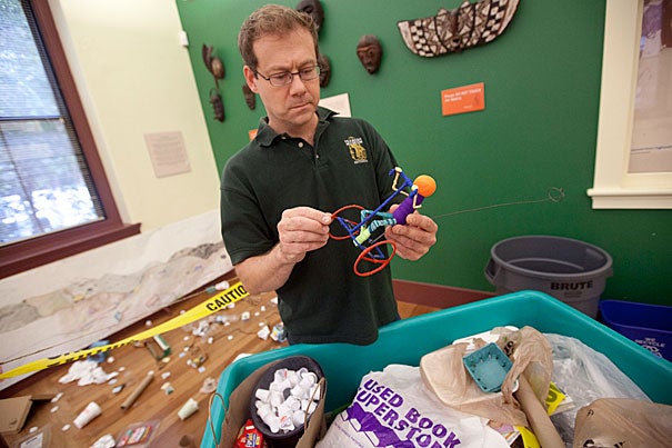 For a few weeks, Peabody Museum education specialist Andrew Majewski had museum staff members compile a supply of cleaned trash to be fashioned into toys, bringing in items from home.