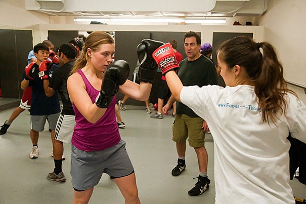 At practice, women do the same exercises as their male counterparts — 100 reps of sit-ups and push-ups, punching bag drills, and more. “Forget about the boxing aspect for a moment,” said Susan Seav '12 (not pictured). “A lot of girls join the club just to get a good workout, and to find a buddy who understands the pain.”