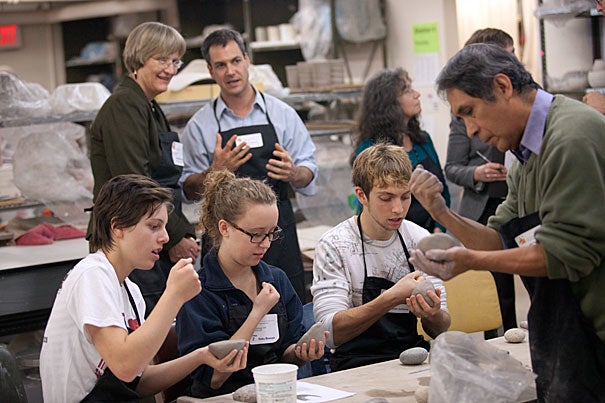 “This is a perfect example of the way the arts can meld into the undergraduate curriculum and serve as an important teaching tool for the big questions that archaeology and anthropology pose,”  said Harvard President Drew Faust (left). In offering some background on the course, Assistant Professor Matthew J. Liebmann (right) said, “Everybody in the course has a little archaeological experience because they all took part in an excavation in Harvard Yard. So everybody has been in the dirt at least one day.”