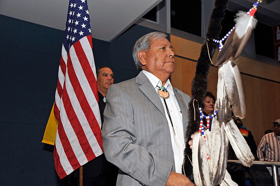 Walter Dasheno, governor of Santa Clara Pueblo, leads the opening ceremonies at the National Indian Education Association convention. Jon Chase/Harvard Staff Photographer
