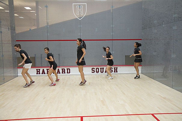 The men’s and women’s squash teams are as yet undefeated, winning their last nine and seven matches, respectively. “We’ve been training really hard,” said women's co-captain Nirasha Guruge (far right).