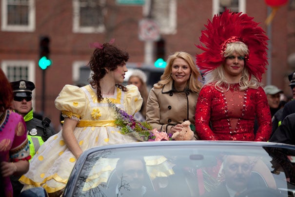Members of Hasty Pudding Theatricals, dressed in drag, escort 2012 Woman of the Year Claire Danes in the traditional parade down Massachusetts Avenue.