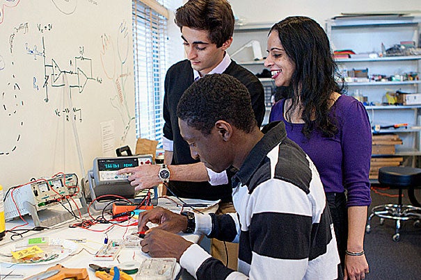 Students in the undergraduate teaching labs at SEAS are investigating plant-based materials that may help regrow damaged neurons. The team includes (from front to back) Godwin Abiola '14, Undergraduate Studies in Biomedical Engineering Assistant Director Sujata Bhatia, and Erfan Soliman '12.