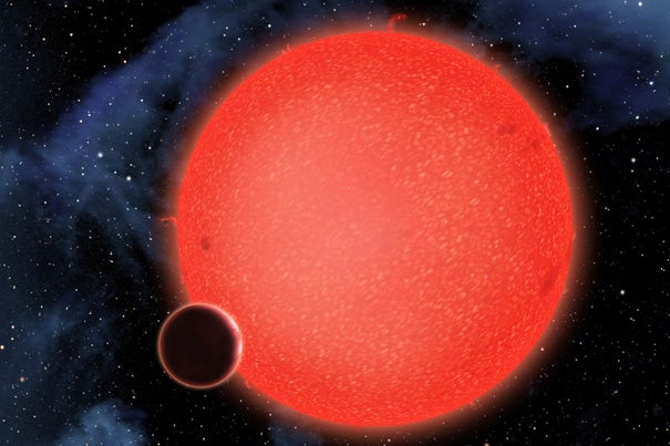 GJ1214b, shown in this artist's conception, is a super-Earth orbiting a red dwarf star 40 light-years from Earth. New observations from NASA's Hubble Space Telescope show that it is a water world enshrouded by a thick, steamy atmosphere. GJ1214b therefore represents a new type of world, like nothing seen in our solar system or any other planetary system currently known.
