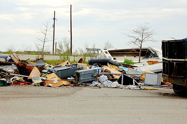 Debris lingered just outside New Orleans in July 2006, almost a full year after Hurricane Katrina devastated the region. 