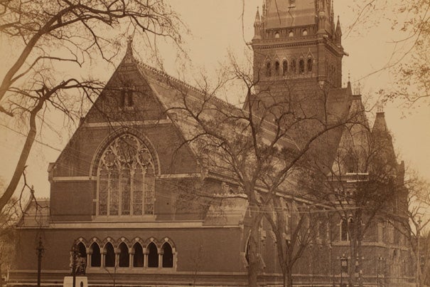 Memorial Hall was to be an ornate Gothic Revival structure, with 5,000 square feet of stained glass, a 210-foot tower, intricate slate roofing, and gargoyles sheathed with copper. 