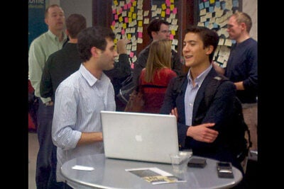 Zachary Hamed '14 (left) chats with Stanford sophomore John Yang-Sammataro (right) during the trip to Silicon Valley. 