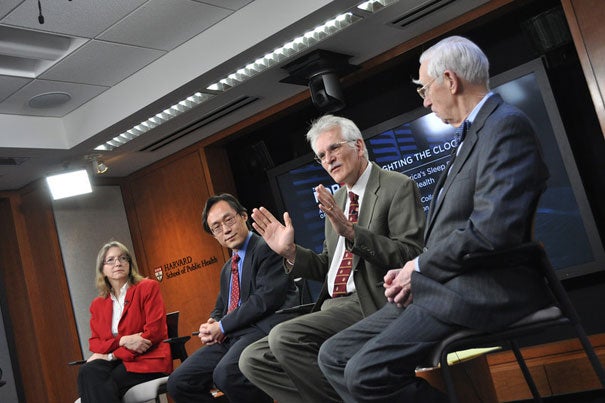 Charles Czeisler (second from right), Baldino Professor of Sleep Medicine, discusses America’s sleep problems during an HSPH forum event. Other panelists include Susan Redline (from left), Farrell Professor of Sleep Medicine; Frank Hu, professor of nutrition and epidemiology; and Lucian Leape, adjunct professor of health policy.   