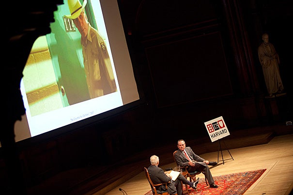 John Lithgow '67 (from left) talks with Tommy Lee Jones '69, who received the Harvard Arts Medal Thursday afternoon. “I believe that my experience here was the best thing that happened to my creative life, and the reason for that is not simply what I learned, but I learned how to learn and I haven’t stopped," Jones told the audience at Sanders Theatre. 