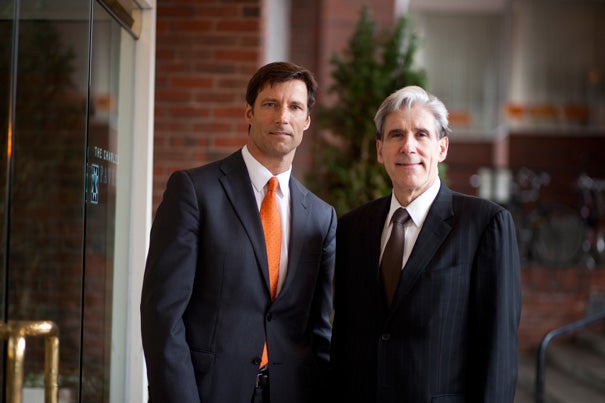 Mike VanRooyen (left) and Harvard School of Public Health Dean Julio Frenk were on hand to launch the Humanitarian Academy at Harvard. The program will be offered by the Harvard Humanitarian Initiative (HHI), an interfaculty effort that VanRooyen directs and that is focused on using research to improve aid response.