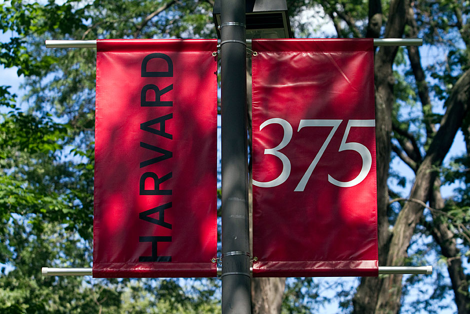 Banners hanging in Tercentenary Theatre proclaim Harvard's 375th anniversary. Jon Chase/Harvard Staff Photographer