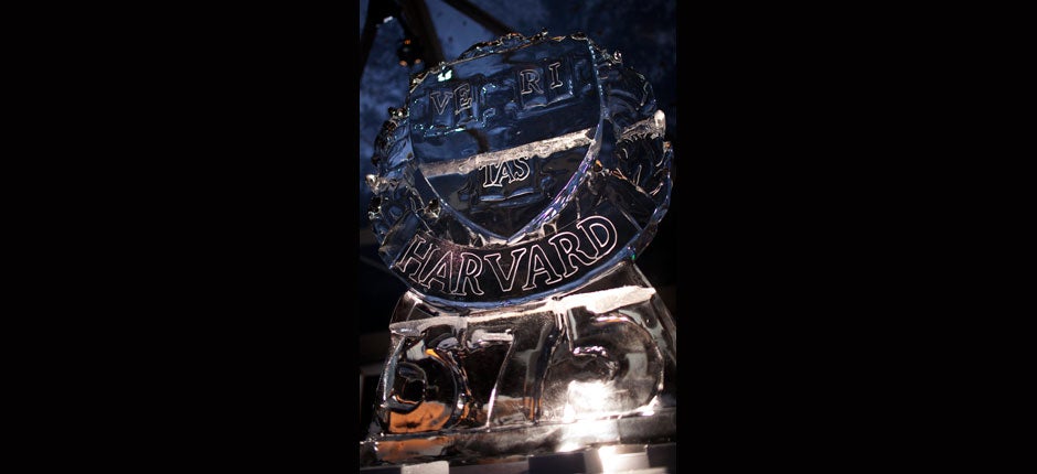 The veritas shield and 375 logo decorate an ice sculpture inside one of the tents in Tercentenary Theatre as Harvard celebrates its 375th year. Justin Ide/Harvard Staff Photographer