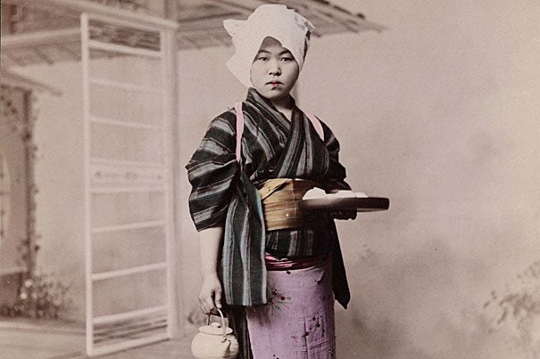 Tamamura Kozaburo's "Woman holding tea set," a hand-colored albumen print mounted on album page, is one of the more than 2,000 images in the virtual exhibit “Early Photography of Japan."