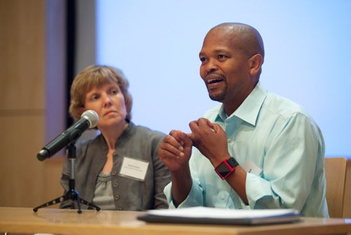 The disease is mistakenly viewed as a problem of poverty. “TB doesn’t discriminate; anyone can get it,” said panelist Khisimuzi Mdluli (right). The symposium, moderated by Barry Bloom, focused on the reasons for the emergence of drug-resistant TB and what can be done to remedy this growing crisis. Among the panelists was Sarah Fortune (left), the Melvin J. and Geraldine L. Glimcher Assistant Professor of Immunology and Infectious Diseases at the Harvard School of Public Health.