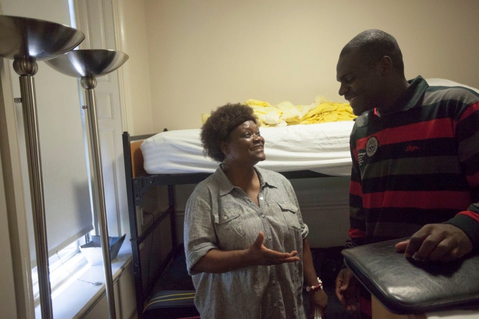 Esther Ojogho and son Dennis confer during Move-In Day.