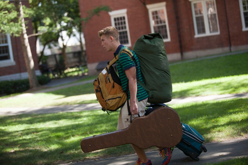 Packed bags? Check. Guitar? Check. Dan Rittenhouse `16 transports his belongings into his new home.