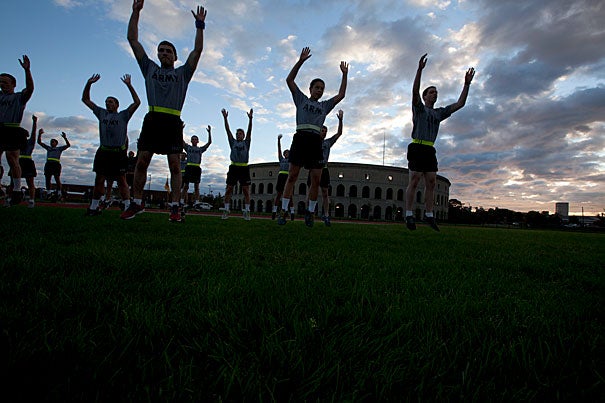 Army ROTC students, part of the Paul Revere Battalion, gathered at dawn at McCurdy Outdoor Track behind Harvard Stadium to begin their group exercise. Monday morning marked the first time in 41 years that the Reserve Officers’ Training Corps students have used Harvard campus facilities for their training. 