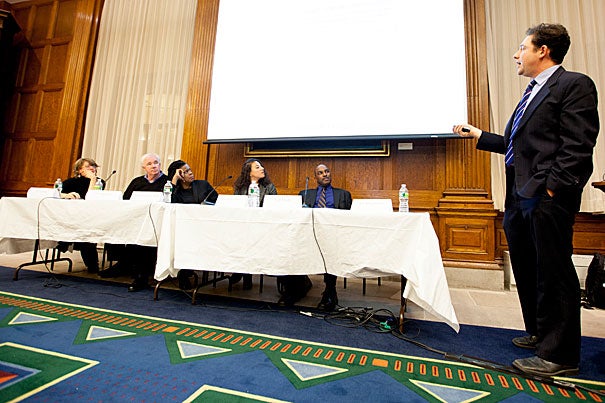 A panel discussion at Harvard University exploring law, history, and the 2012 election included moderator Jill Lepore (from left), and panelists Alex Keyssar, Annette Gordon-Reed, Elizabeth Hinton, Kenneth Mack, and Jed Shugerman (standing). 