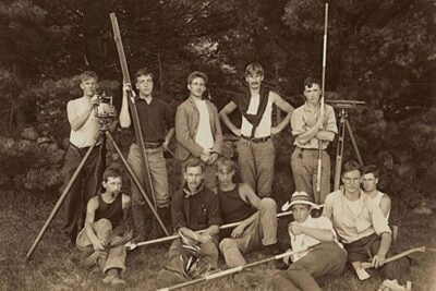 This 1902 photograph shows a group of rugged-looking students at a Harvard engineering camp at Squam Lake, N.H. On Oct. 1, the Harvard School of Engineering and Applied Sciences celebrated the 50th anniversary of ABET accreditation for its Scientiæ Baccalaureus (S.B.) degree in engineering sciences. ABET stands for Accreditation Board for Engineering and Technology. 