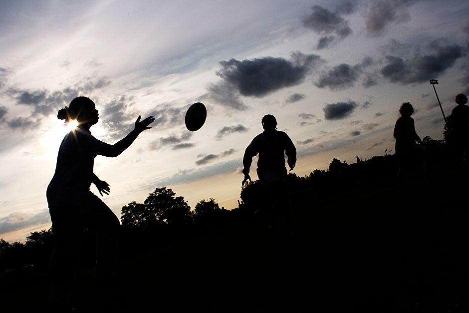 As daylight fades, the Harvard-Radcliffe Rugby Football Club keeps practicing. Rose Lincoln/Harvard Staff Photographer