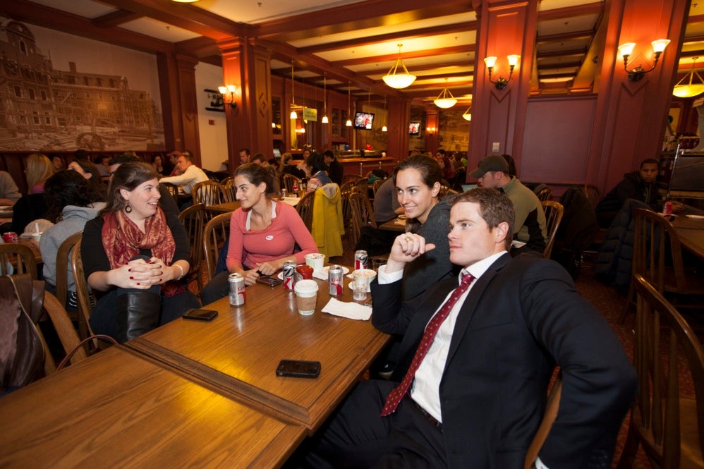 Harvard University Business School students, Zanna McComish (from left), Bari Schwartz, Leslie Kurkjiam, and Cliff Adams who is co- president of the HBS Republican Club all watch the election results at the Spangler Grille at Harvard University Business School. Rose Lincoln/Harvard Staff Photographer