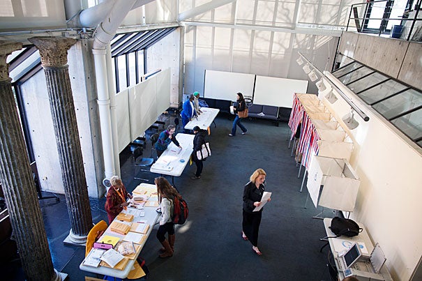 Voters cast their ballots in the Gund Hall polling location at the Harvard Graduate School of Design.