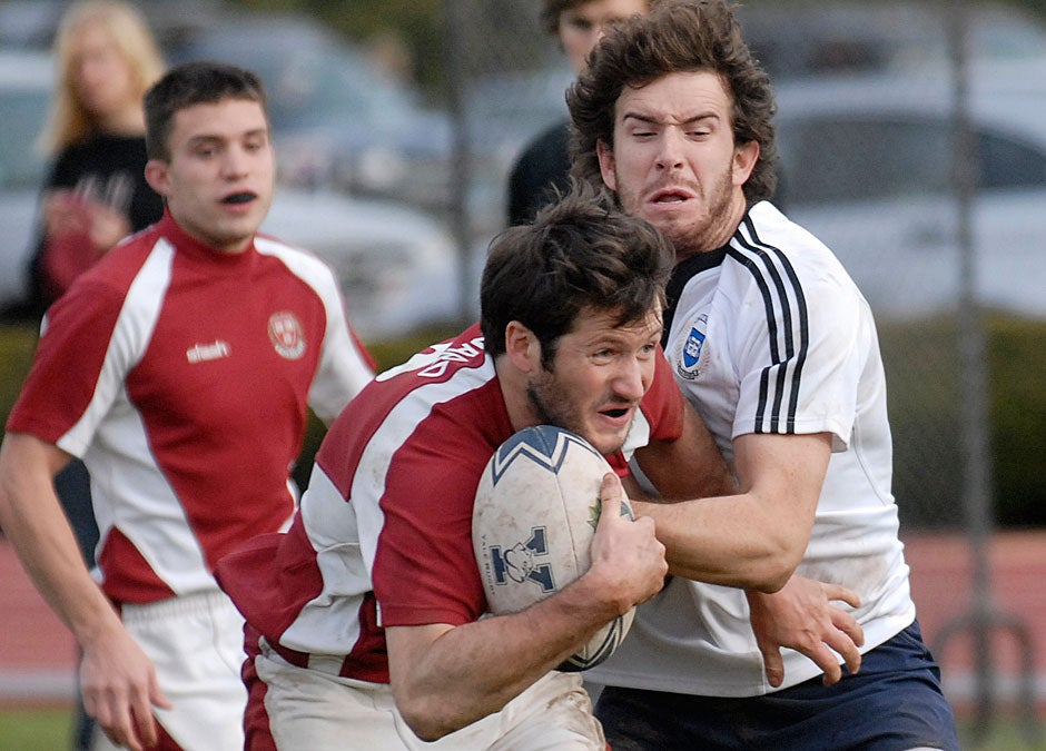 In 2009, a Harvard player struggles to score during the Harvard-Yale rugby match, which often precedes the football game. Established in 1872, the Harvard Rugby Football Club is one of the College’s oldest athletic teams and the first rugby club in North America. 