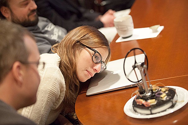 Elizabeth Kane looks at a Stirling heat engine model that eliminates the standard piston system. The presentation was part of the “Physics and Applied Physics Research Freshman Seminar." The seminar challenged students to study and improve upon the Stirling heat engine constructed by last year’s seminar students. 